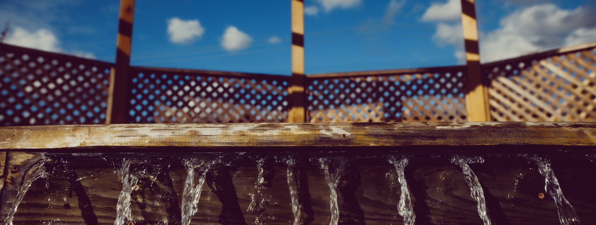 Close up image of a wooden water fountain