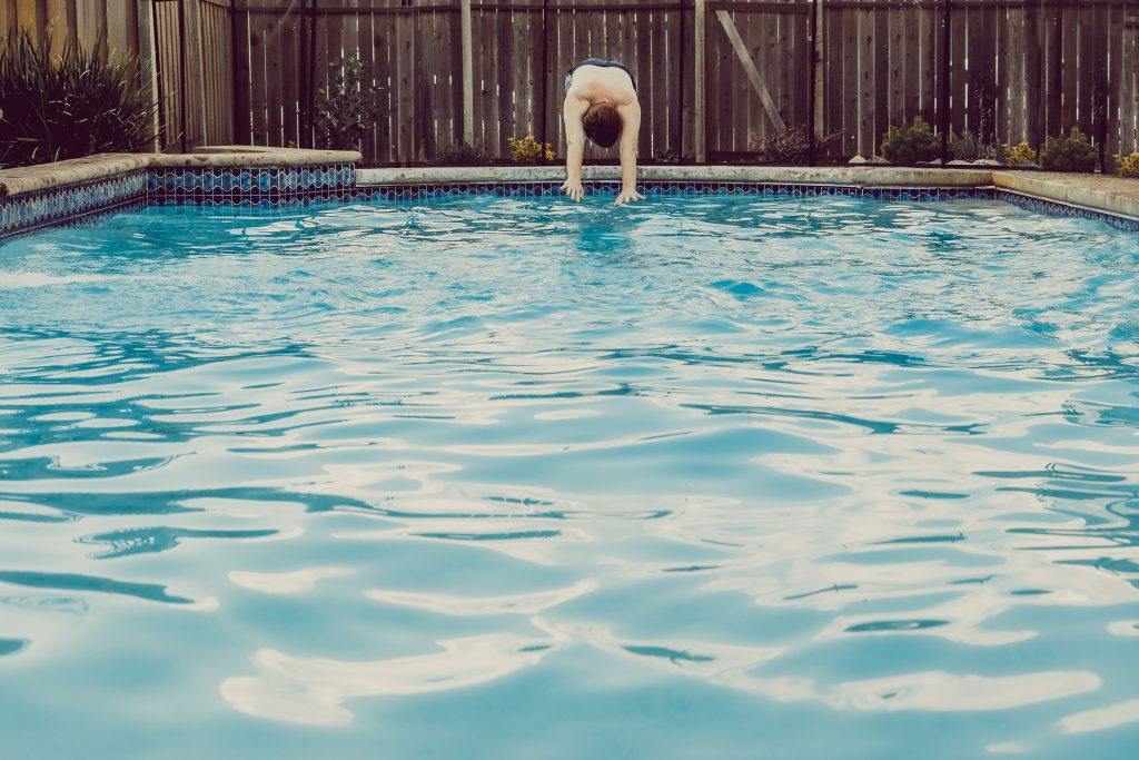 Man diving into a pool